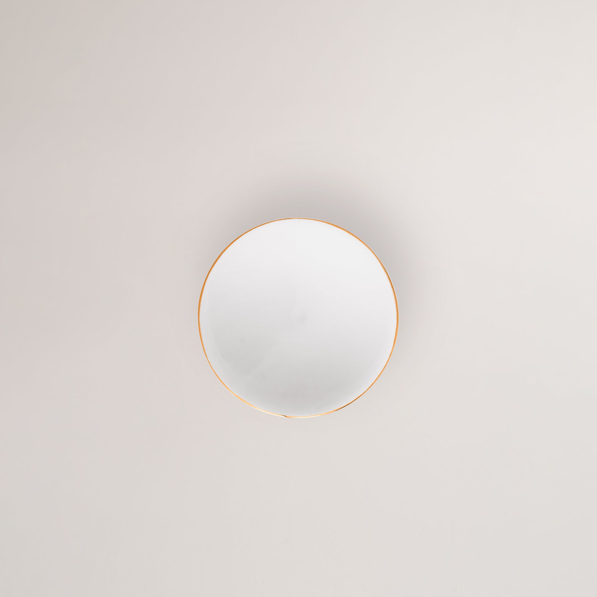 Handmade Limoges porcelain golden rim elevated bowl