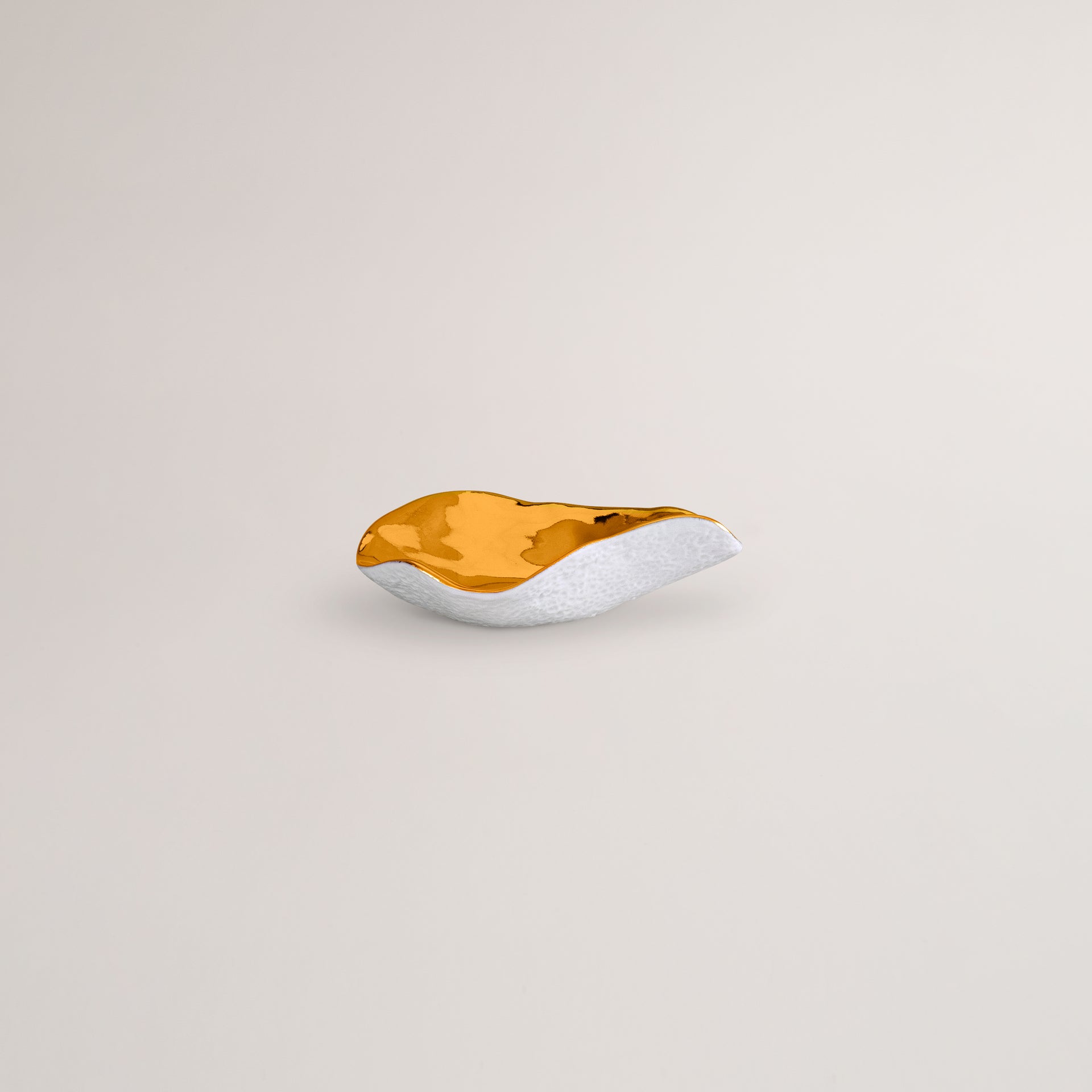 Handmade Limoges porcelain gold starter spoon