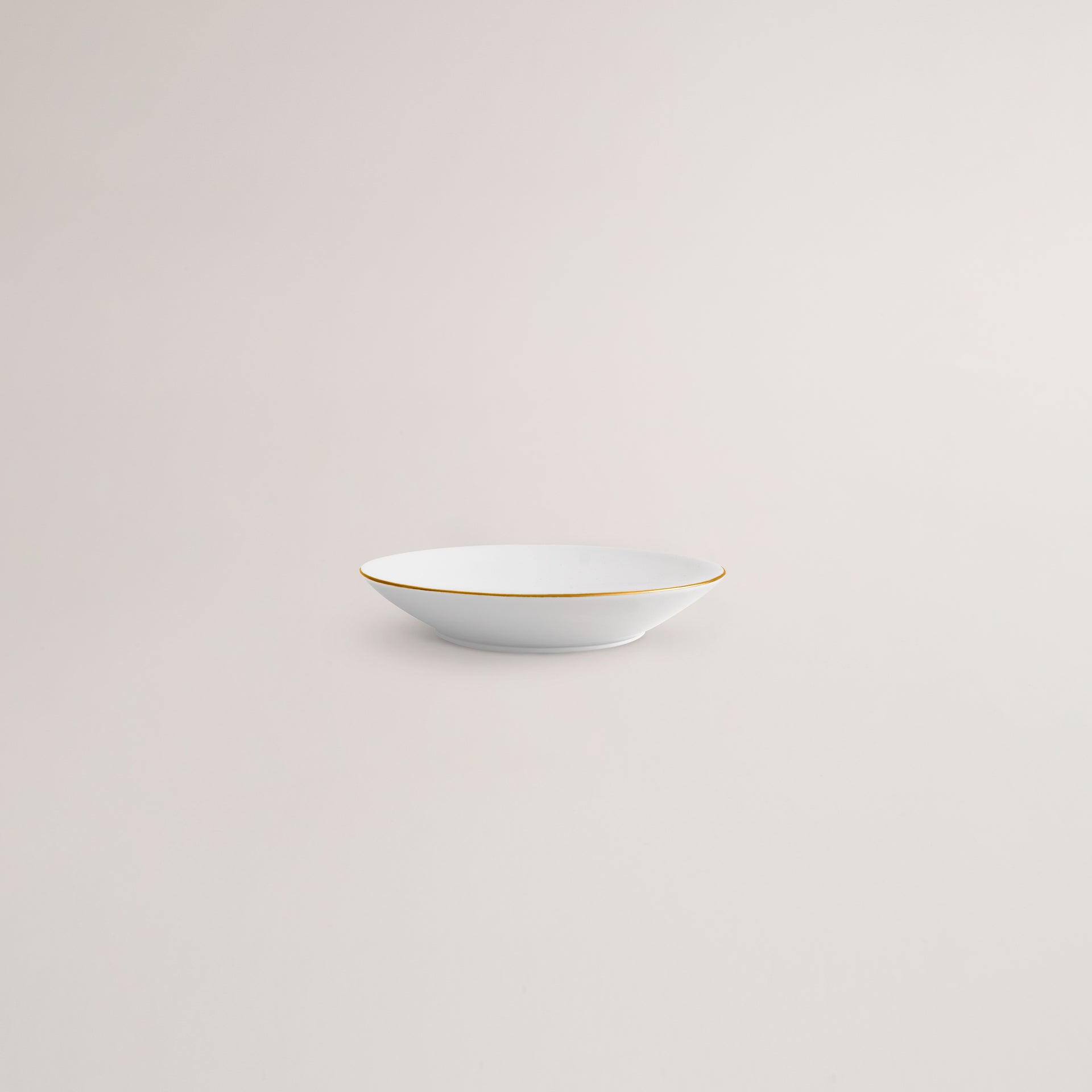 Handmade Limoges porcelain golden rim elevated bowl