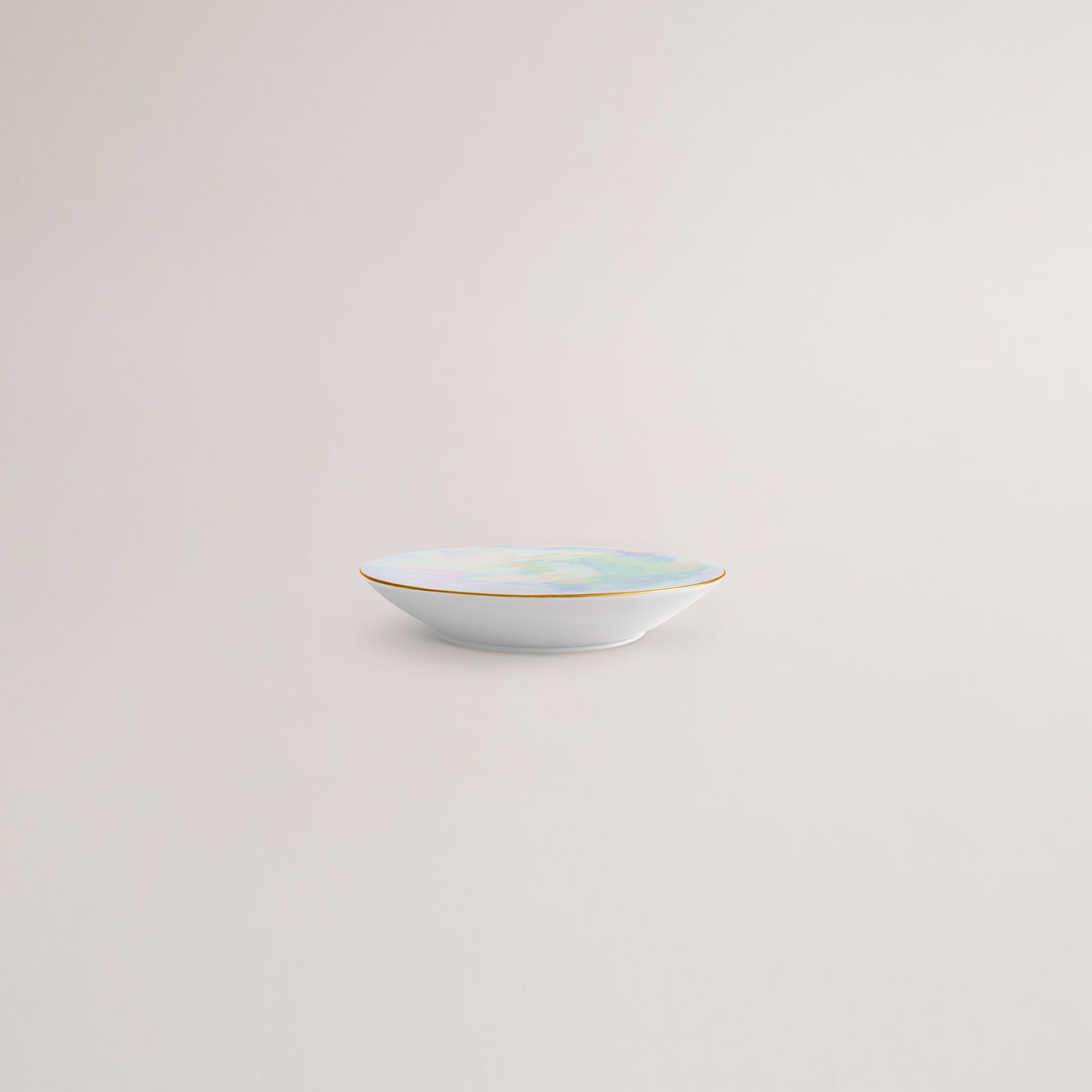 Handmade Limoges porcelain pearlescent elevated bowl